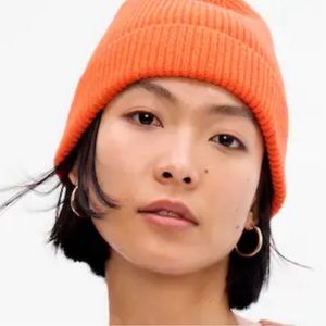 NWOT Gap slouchy knit beanie. One size fits all. Never worn. Bright orange.